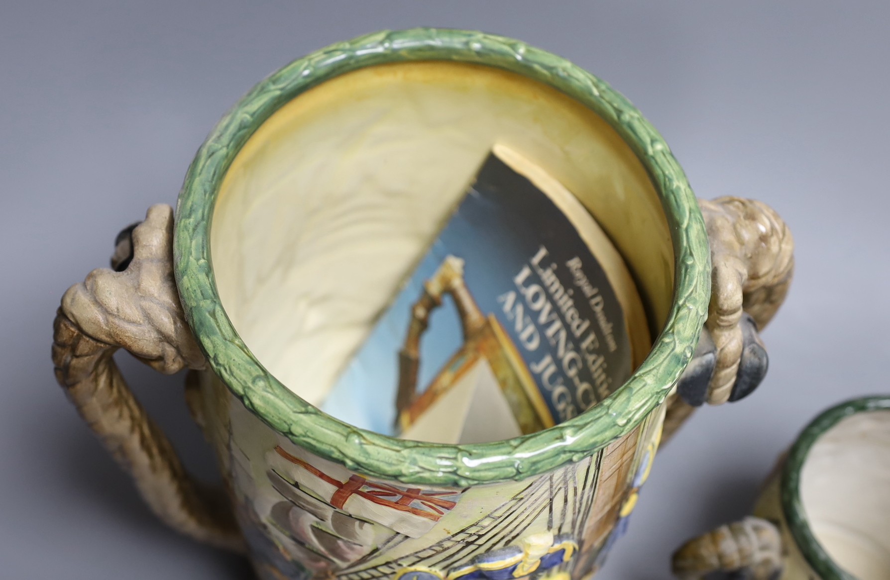 A Royal Doulton Nelson commemorative loving cup, no.453/600, 27cm tall, together with another cup